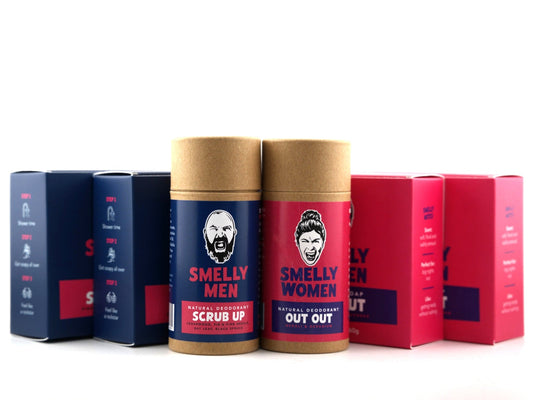 A collection of Smelly Men soap cartons and deodorant tubes on a white background.