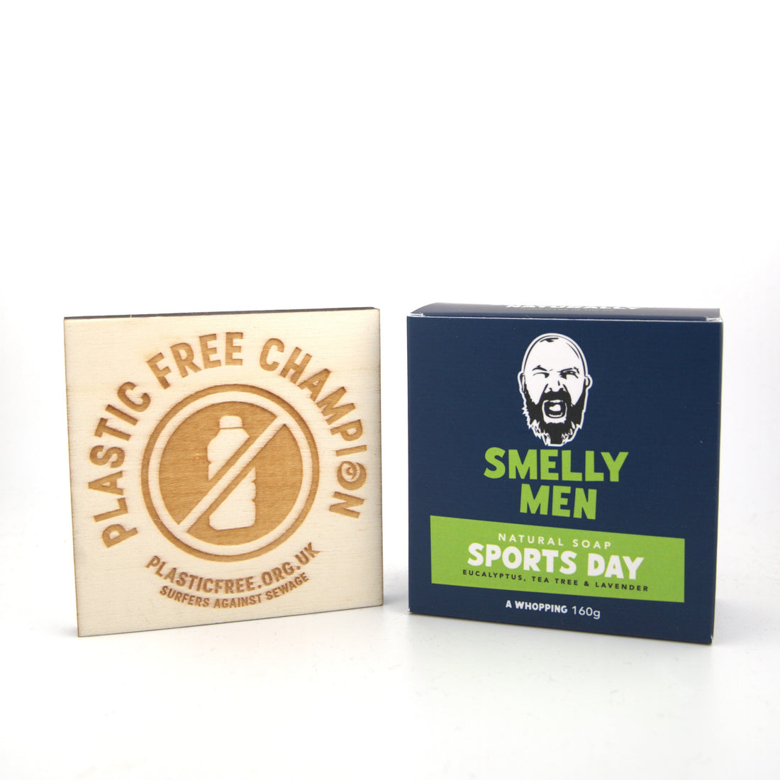 A Smelly Men soap carton next to a wooden plaque on a white background 