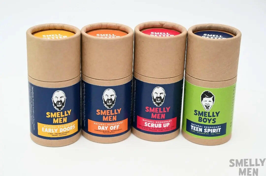 A collection of four Smelly Men deodorants on a white background.