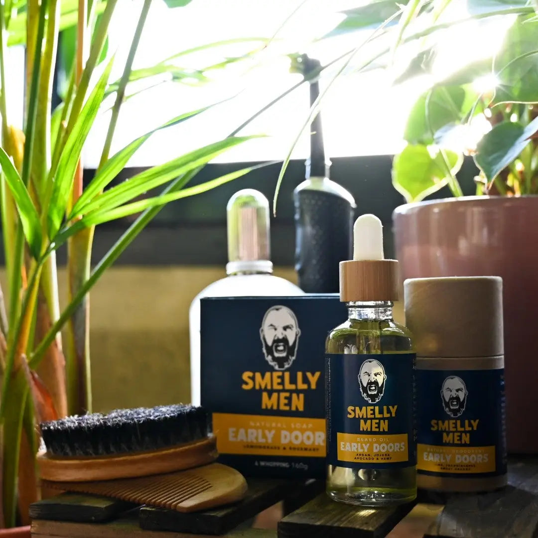 Smelly Men Breakfast of Champions Kit including soap, deodorant and beard oil by a sunny window