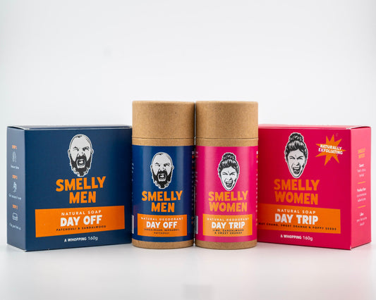 Two soap bars and two dedoorant tubes on a white background