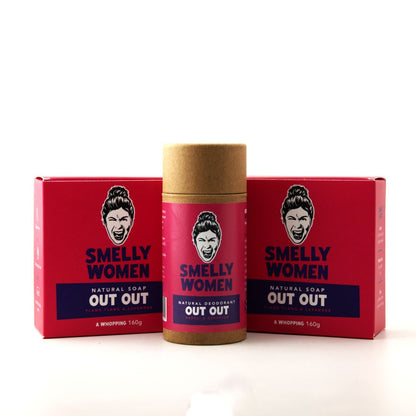 A natural deodorant stick by Smelly Women, shown in its red cardboard packaging with two matching soap cartons, all on a clean white background.