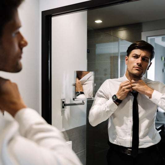 A suave looking young man gets ready for a night out after using Scrub Up