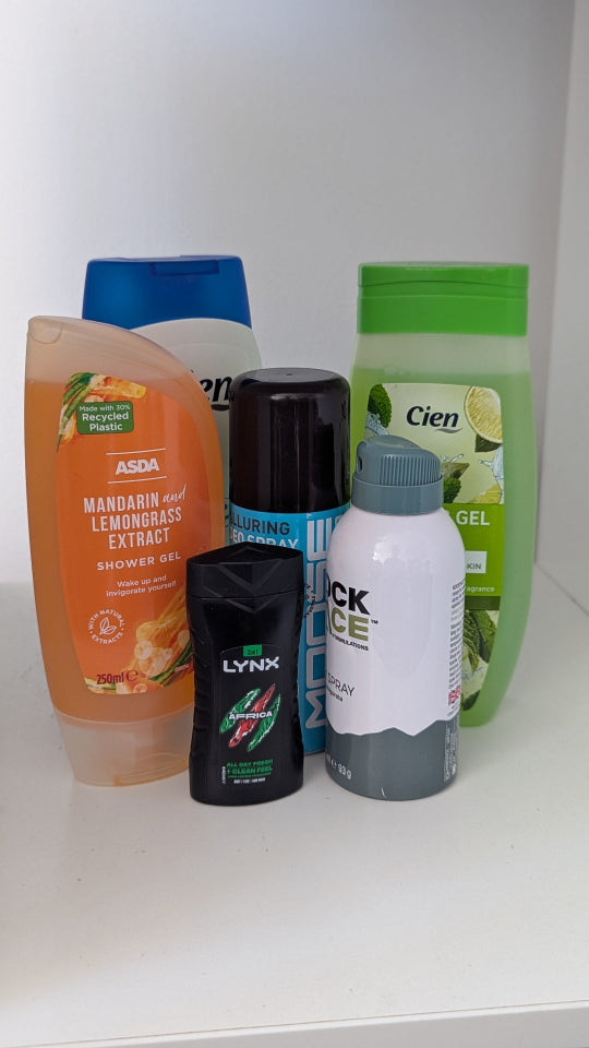 Collection of personal care products on a white surface