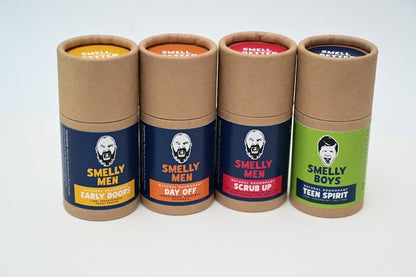 Four cardboard deodorant tubes labeled 'Smelly Men' and 'Smelly Boys' on a white background