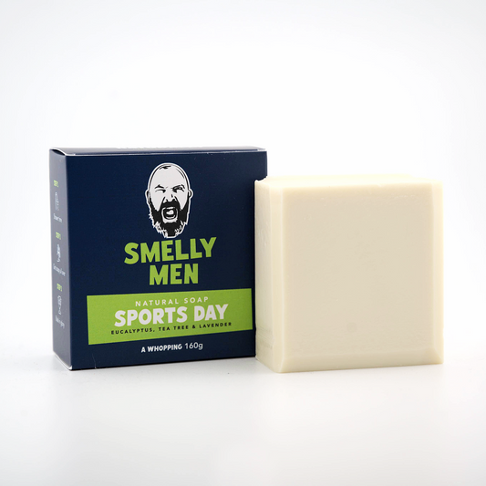 Bar of soap and packaging labeled 'Smelly Men Sports Day' on a white background