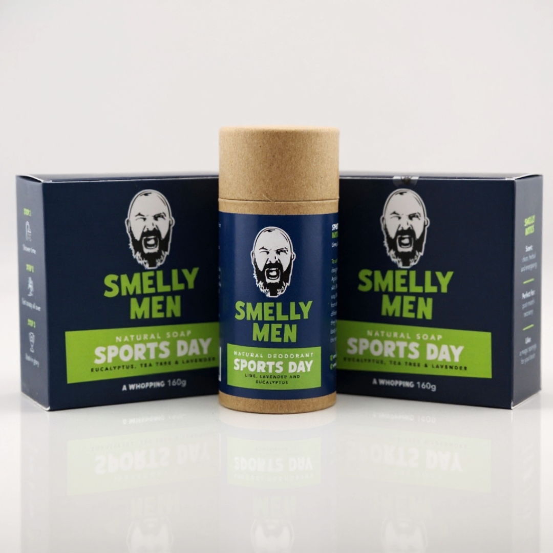Two Smelly Men Sports Day natural soap cartons with deodorant on a white background