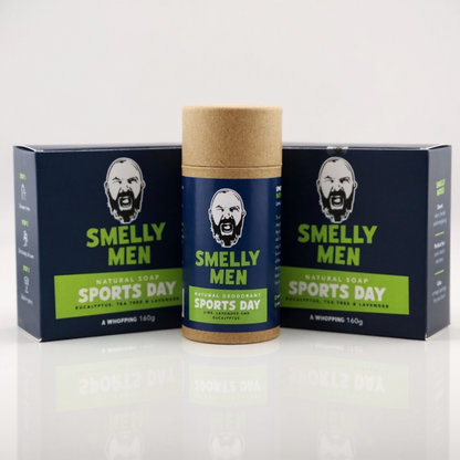 Two Smelly Men Sports Day natural soap cartons with deodorant on a white background
