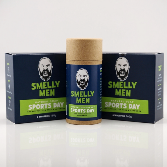 Two Smelly Men Sports Day natural soap cartons with deodorant on a white background